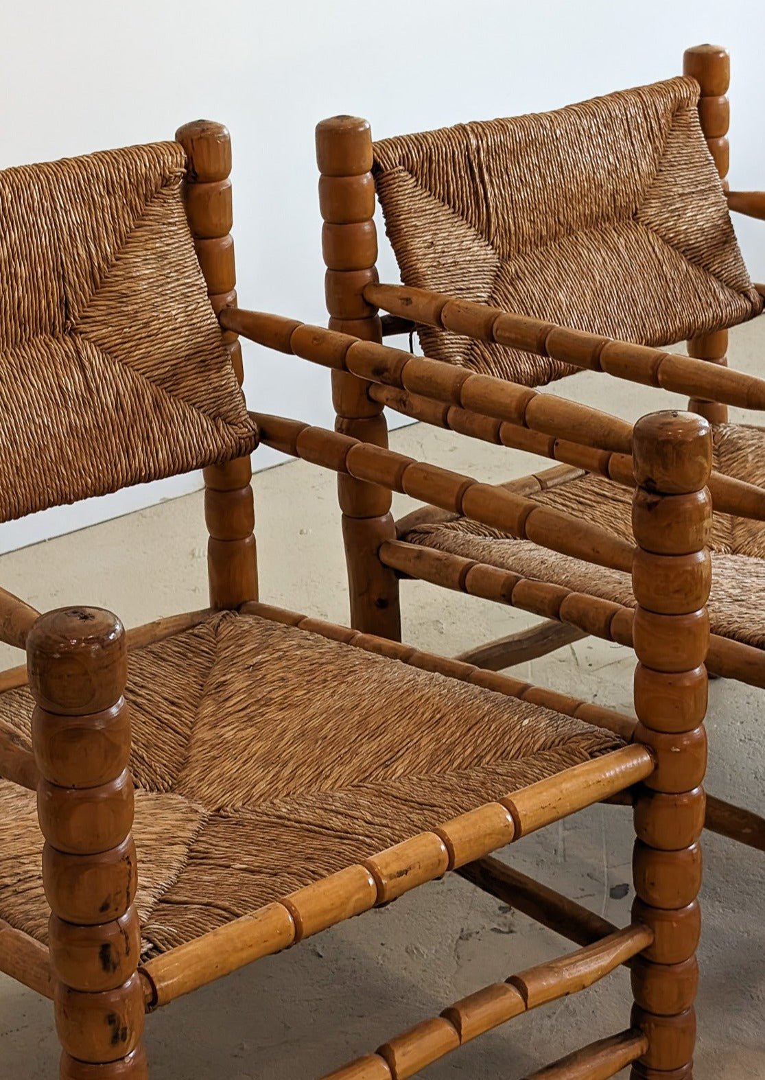 Pair of Vintage Midcentury European Charles Dudouyt-Style Hand-turned Rush and Wood Chairs