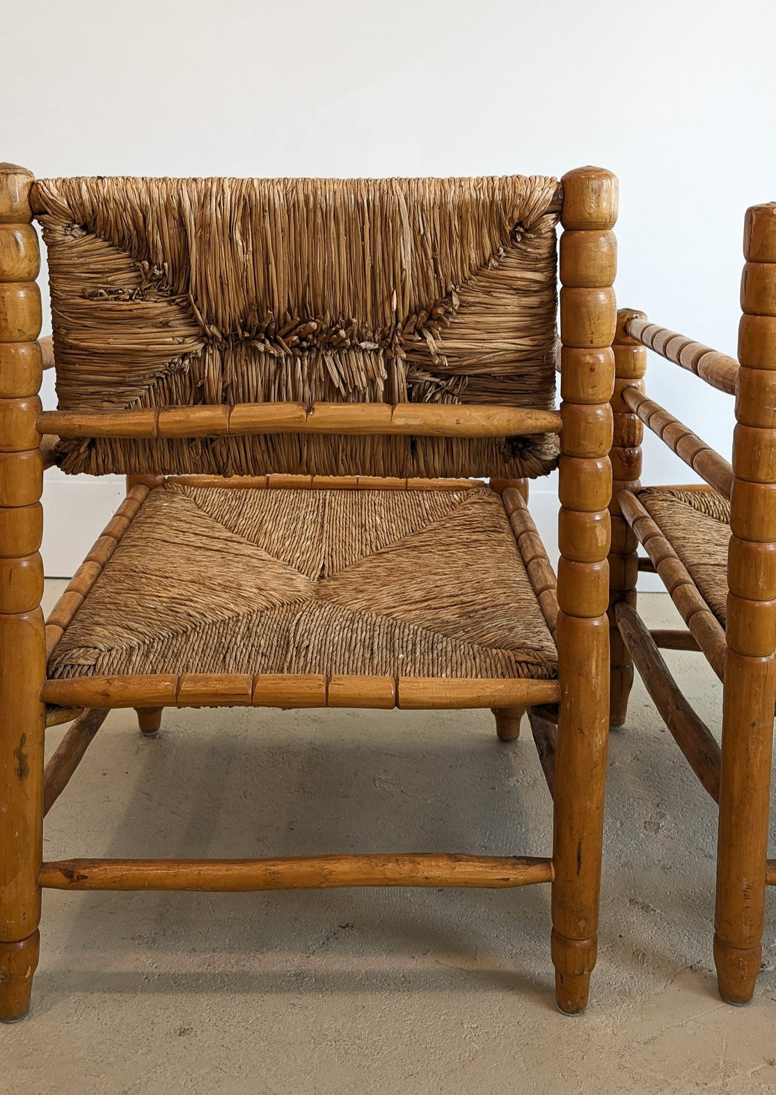 Pair of Vintage Midcentury European Charles Dudouyt-Style Hand-turned Rush and Wood Chairs