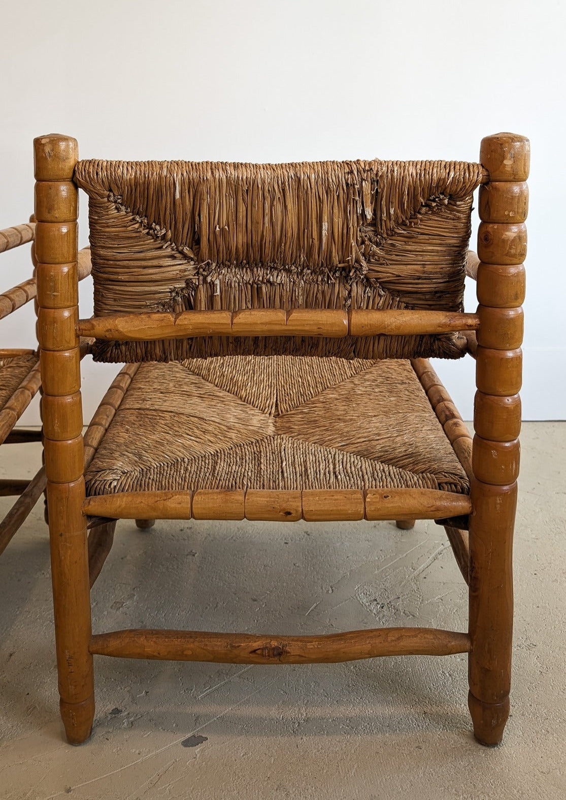 Pair of Vintage Midcentury European Charles Dudouyt-Style Hand-turned Rush and Wood Chairs