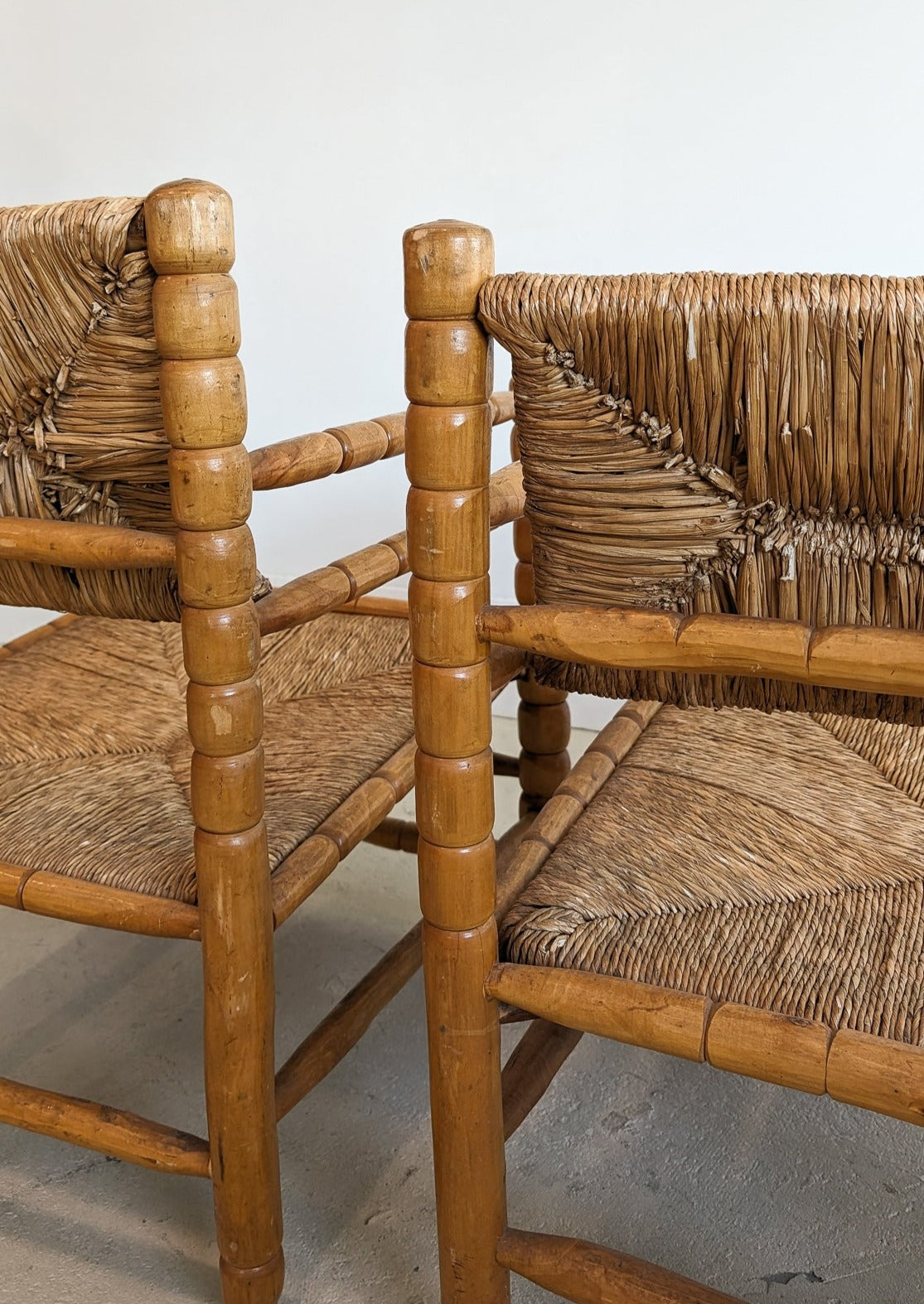 Pair of Vintage Midcentury European Charles Dudouyt-Style Hand-turned Rush and Wood Chairs