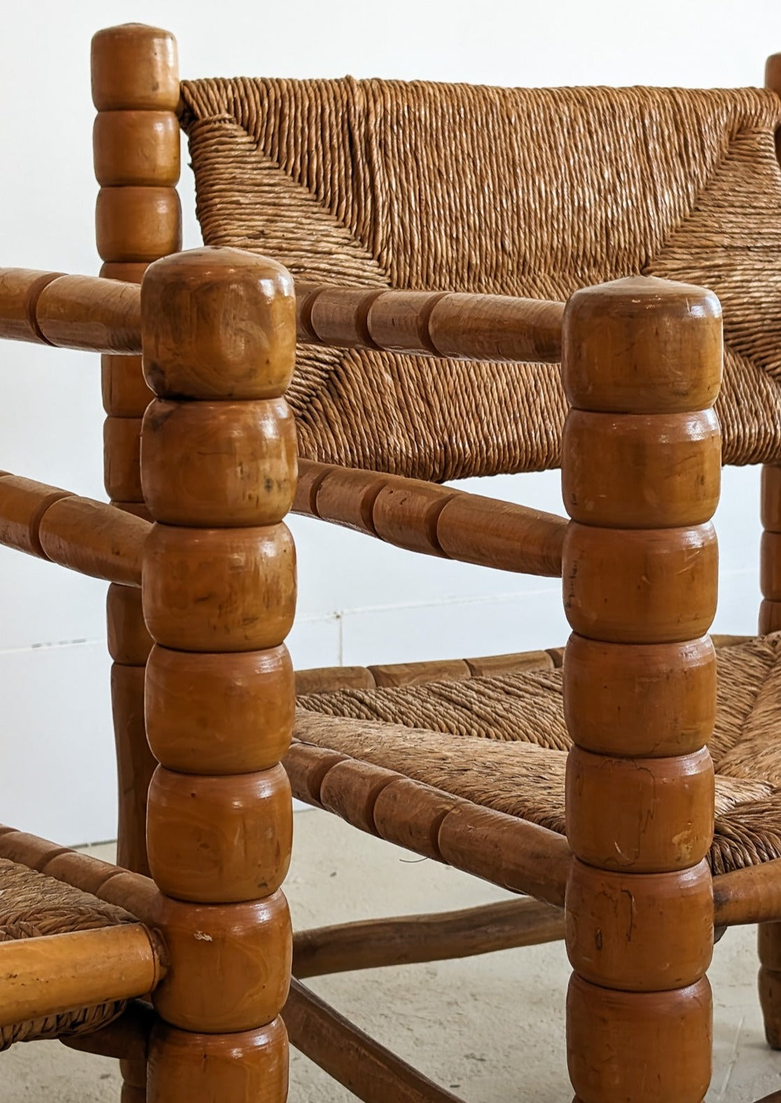 Pair of Vintage Midcentury European Charles Dudouyt-Style Hand-turned Rush and Wood Chairs