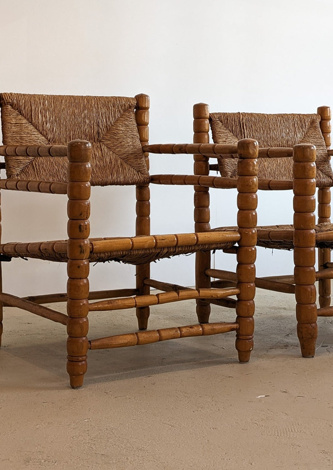Pair of Vintage Midcentury European Charles Dudouyt-Style Hand-turned Rush and Wood Chairs