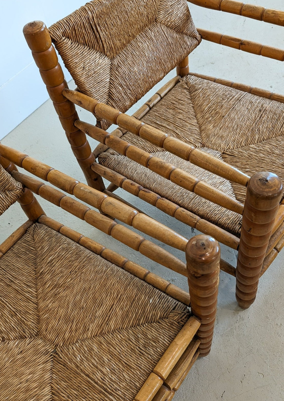 Pair of Vintage Midcentury European Charles Dudouyt-Style Hand-turned Rush and Wood Chairs