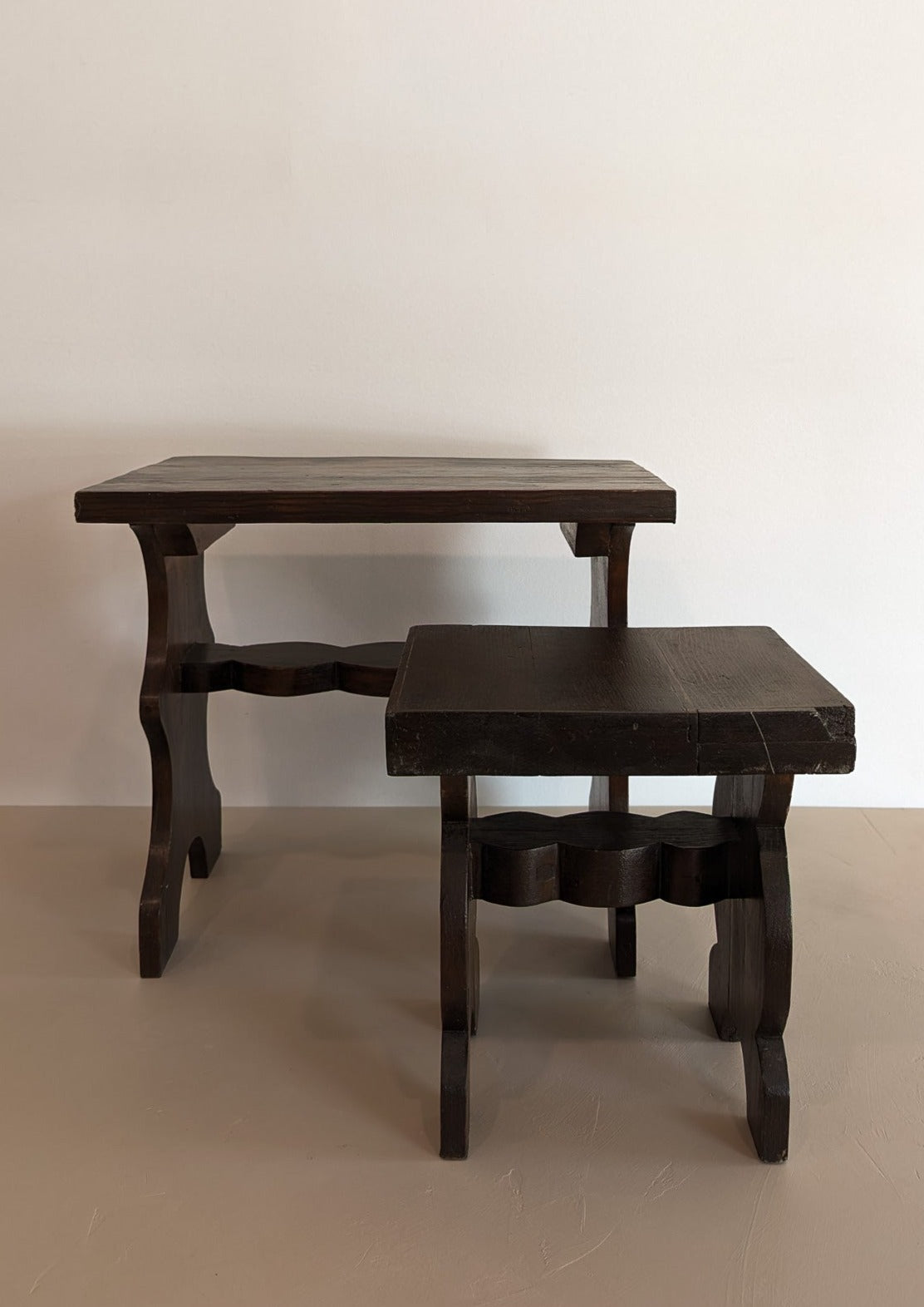 Pair of Vintage Handmade Brutalist Dark Wooden Nesting Tables with Wavy and Scallop Detailing