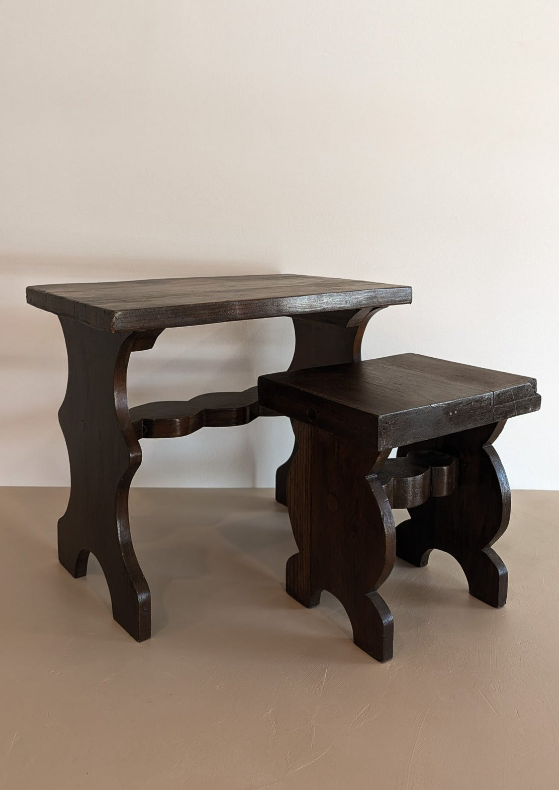 Pair of Vintage Handmade Brutalist Dark Wooden Nesting Tables with Wavy and Scallop Detailing