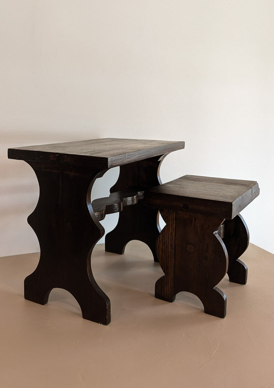 Pair of Vintage Handmade Brutalist Dark Wooden Nesting Tables with Wavy and Scallop Detailing