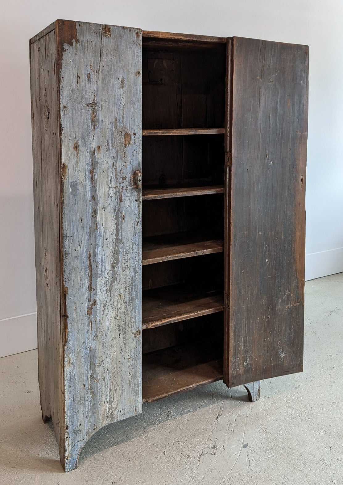 Early 1800s Primitive Blue Cabinet with Brass Stitch Detailing and Square Head Nails