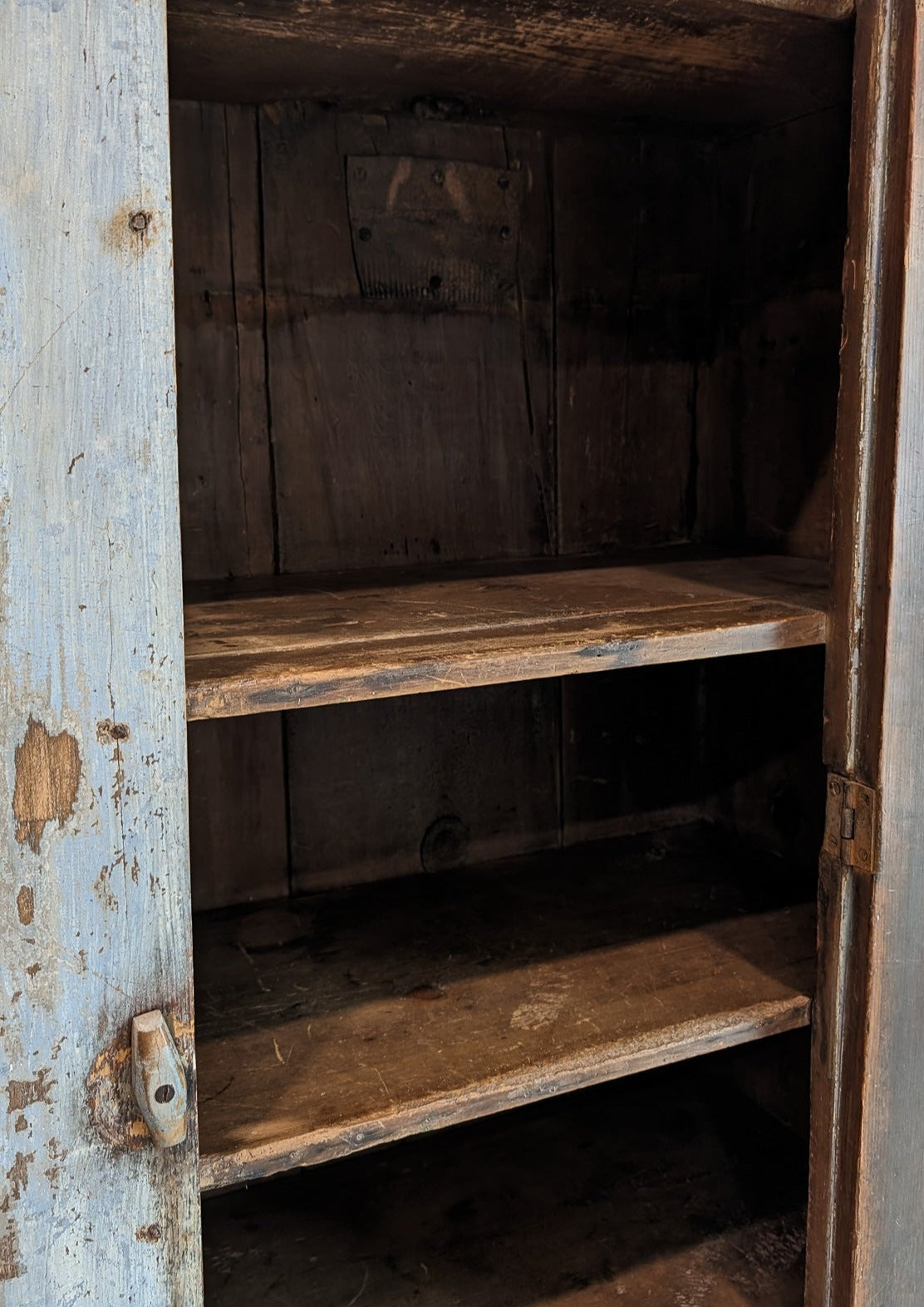 Early 1800s Primitive Blue Cabinet with Brass Stitch Detailing and Square Head Nails