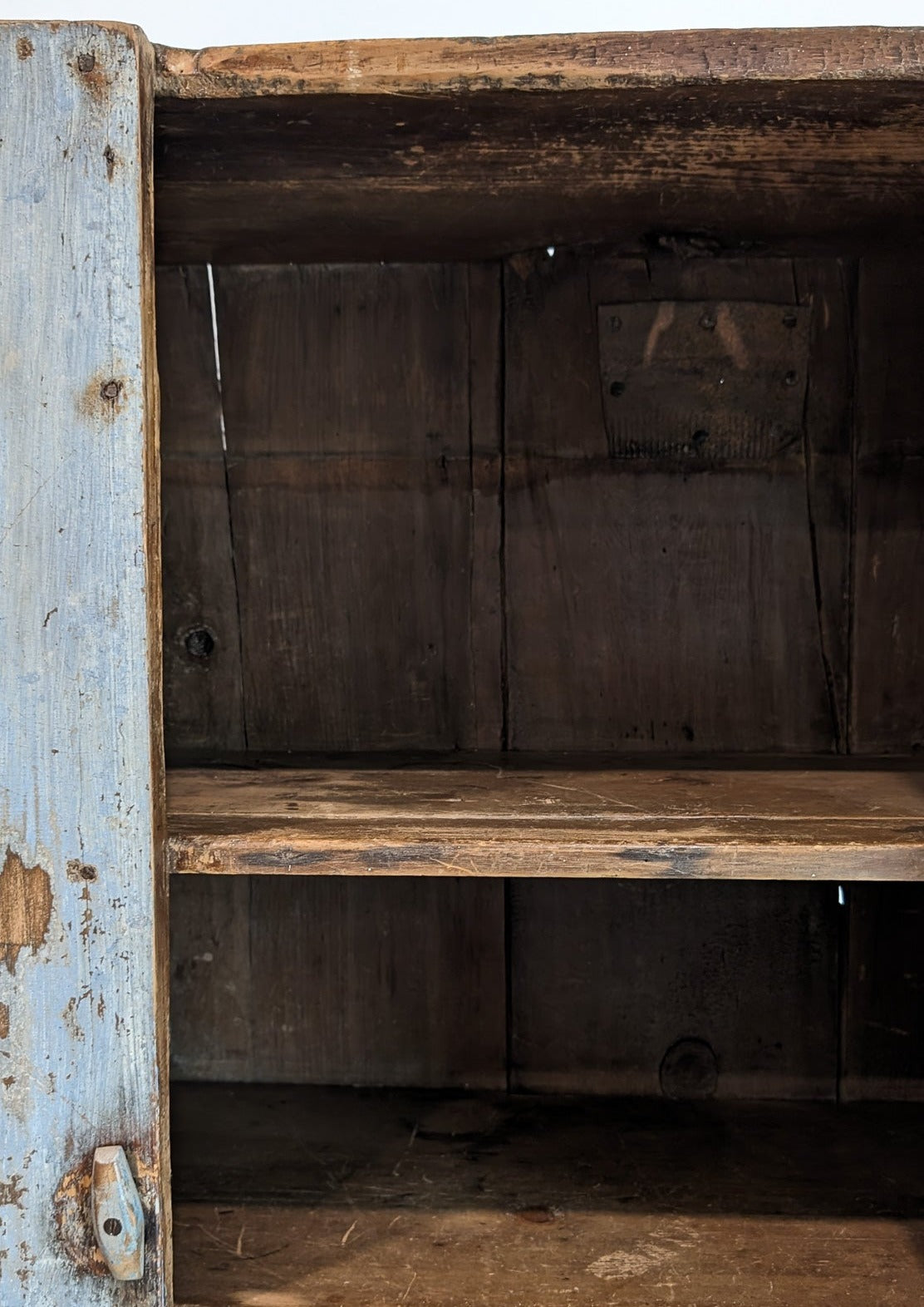 Early 1800s Primitive Blue Cabinet with Brass Stitch Detailing and Square Head Nails