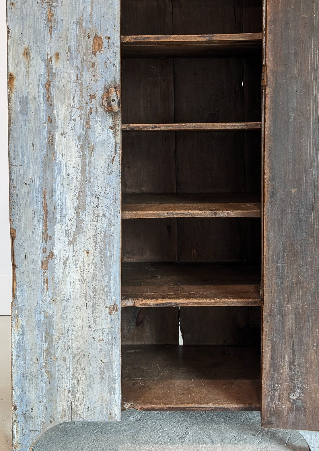 Early 1800s Primitive Blue Cabinet with Brass Stitch Detailing and Square Head Nails