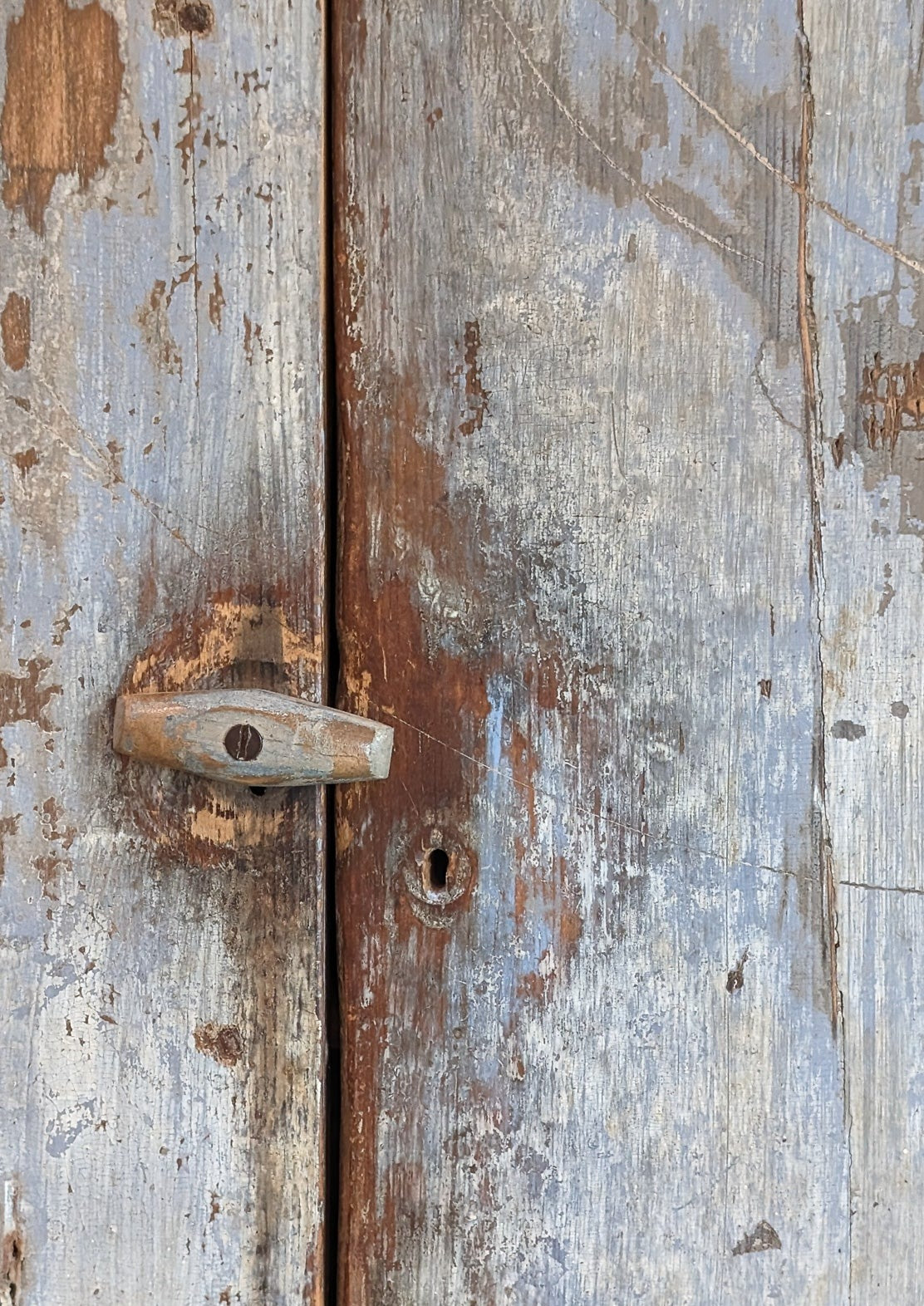 Early 1800s Primitive Blue Cabinet with Brass Stitch Detailing and Square Head Nails