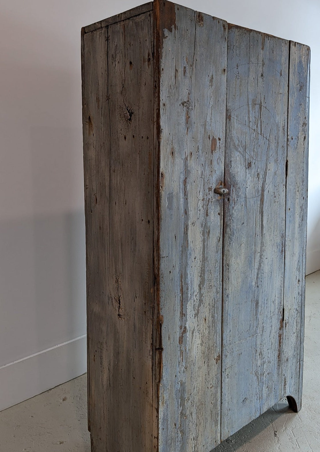 Early 1800s Primitive Blue Cabinet with Brass Stitch Detailing and Square Head Nails