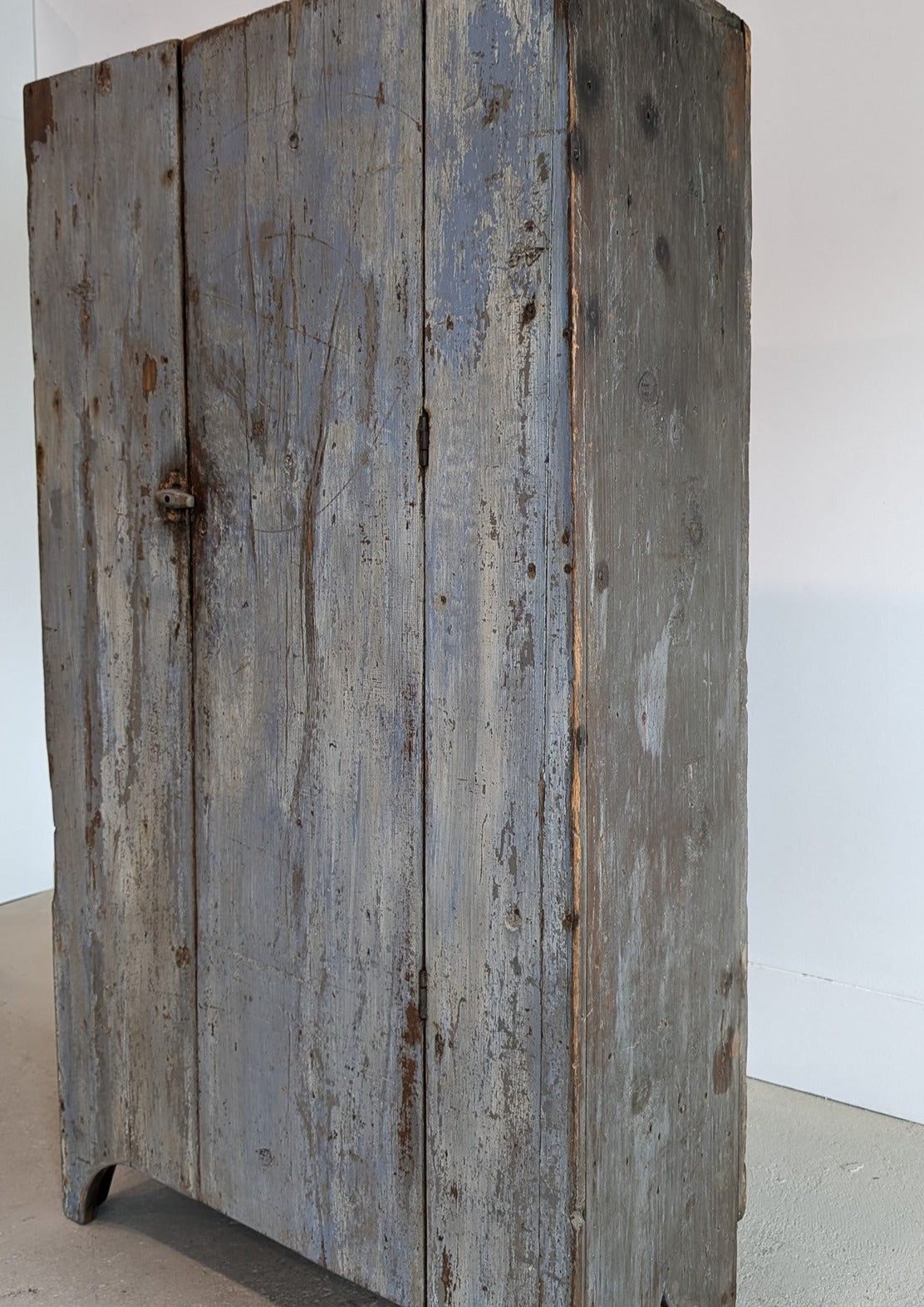 Early 1800s Primitive Blue Cabinet with Brass Stitch Detailing and Square Head Nails