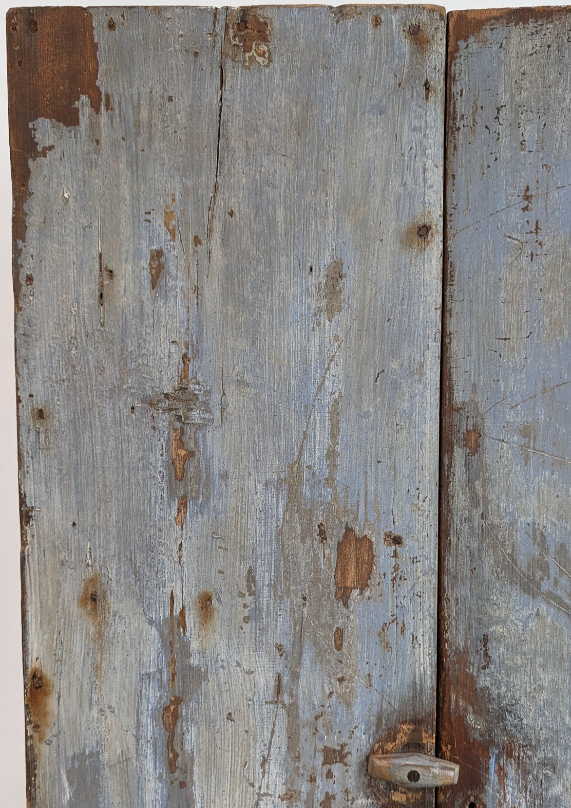 Early 1800s Primitive Blue Cabinet with Brass Stitch Detailing and Square Head Nails