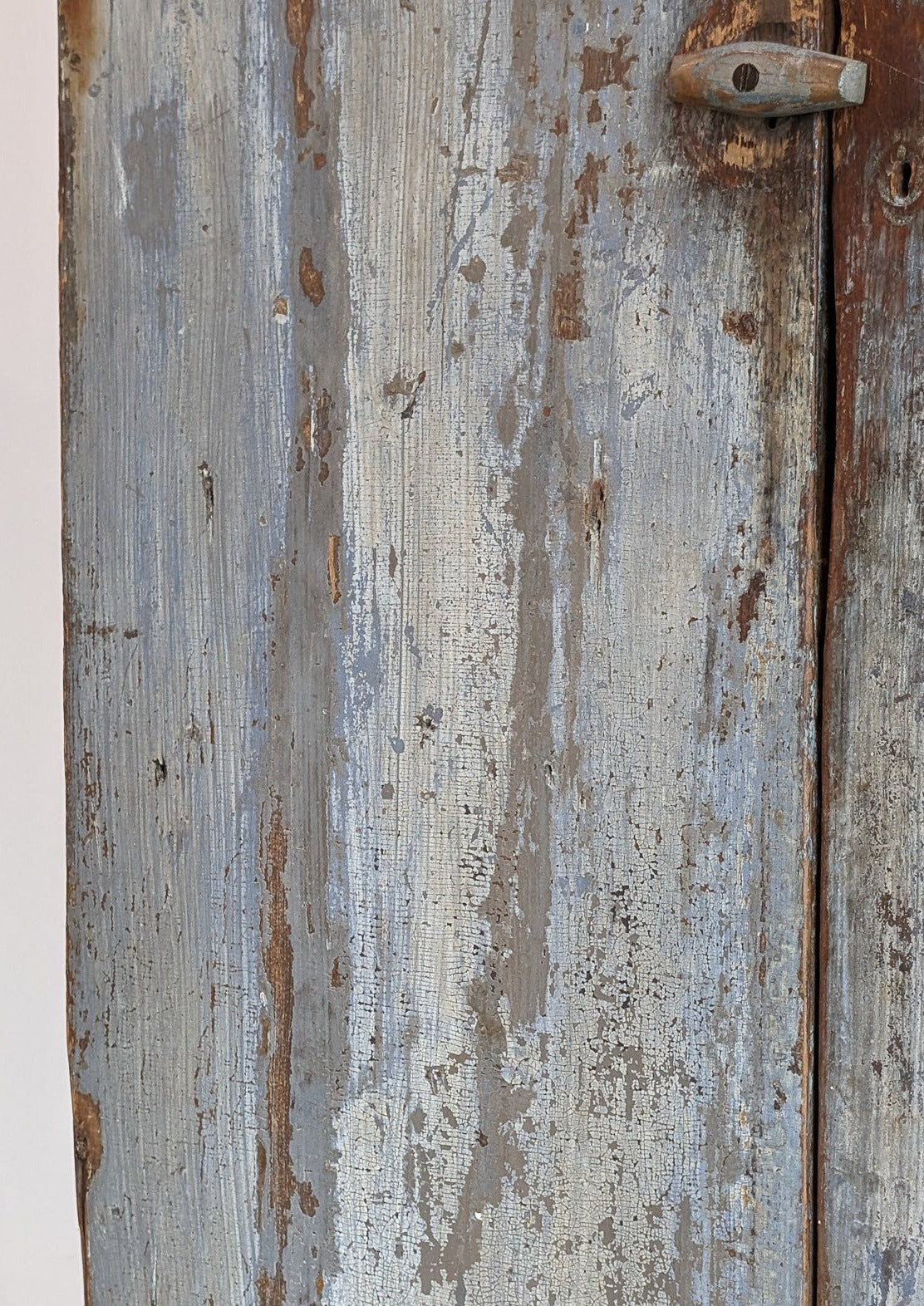 Early 1800s Primitive Blue Cabinet with Brass Stitch Detailing and Square Head Nails