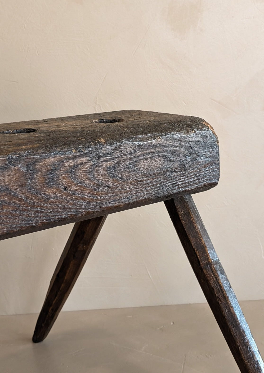 Dark Wooden Primitive Handmade Stool with Holes on Top