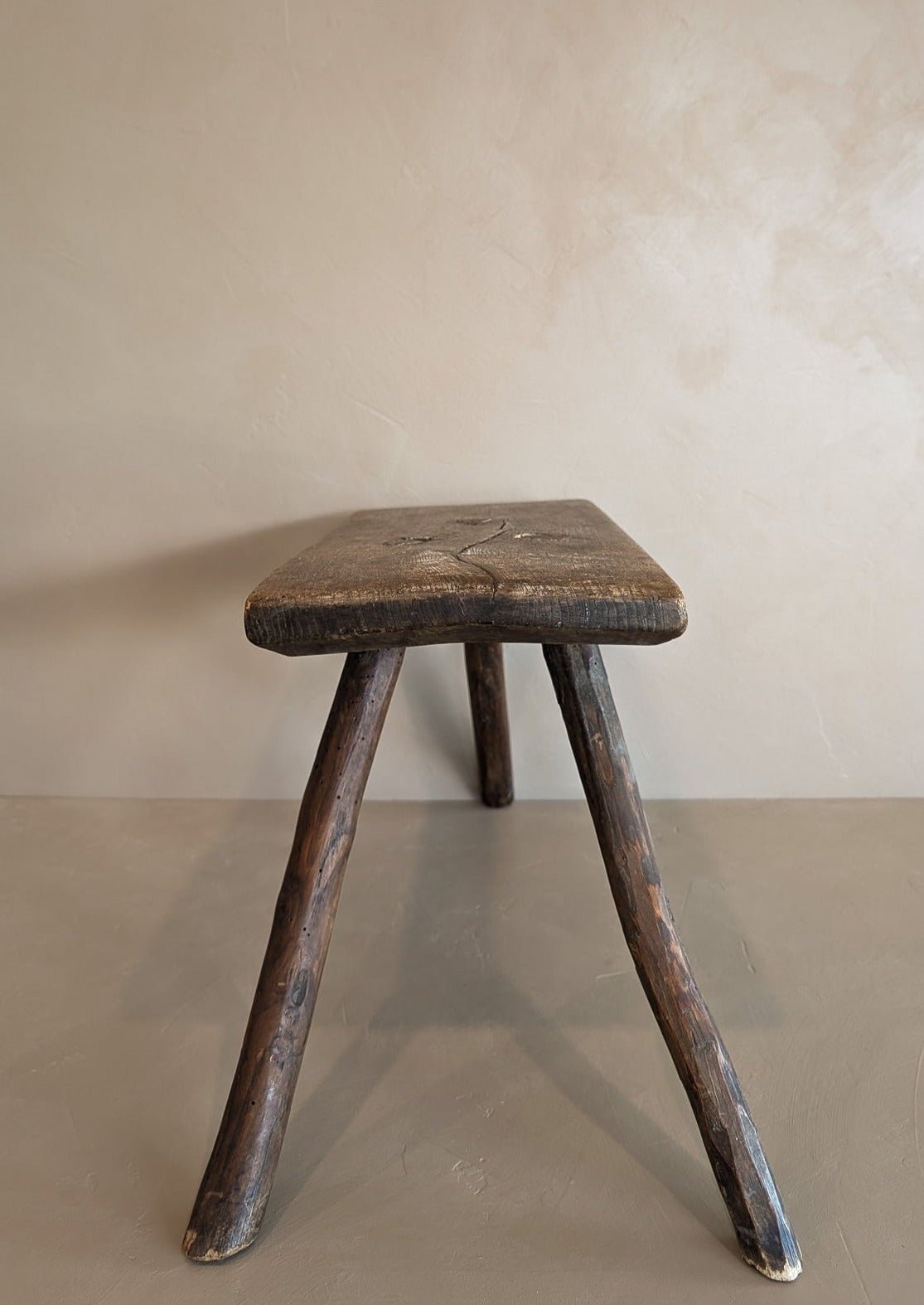 Primitive European Three-Legged Wooden Stool with Slanted Top