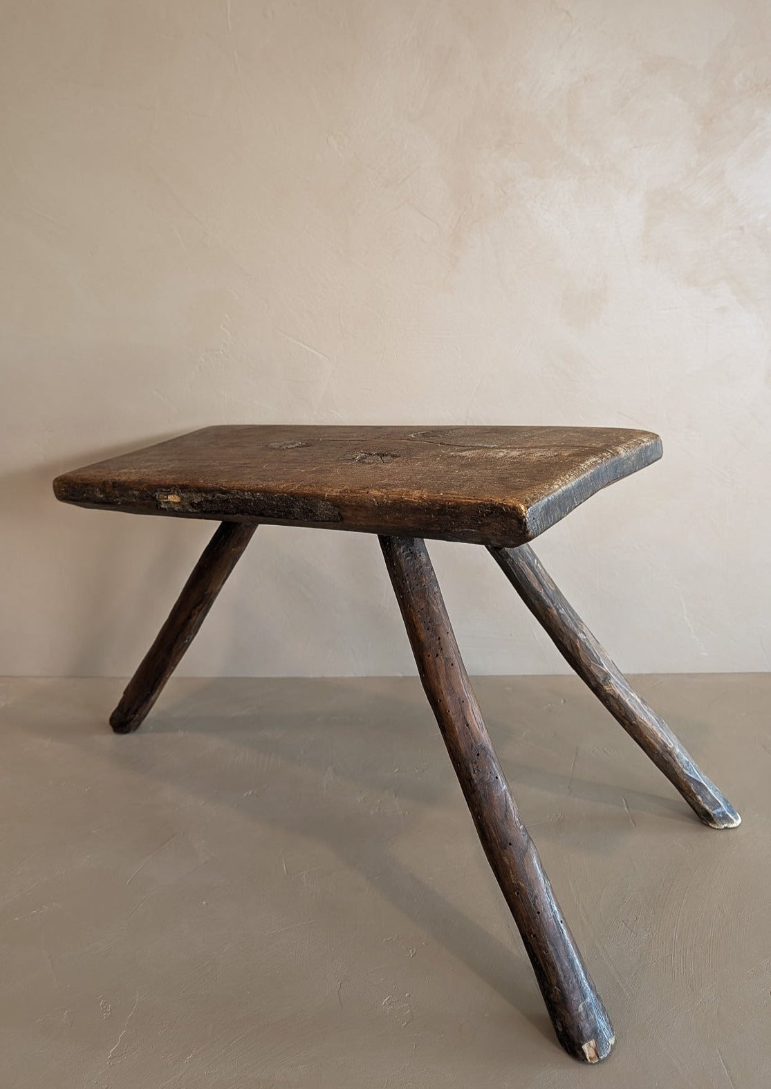 Primitive European Three-Legged Wooden Stool with Slanted Top