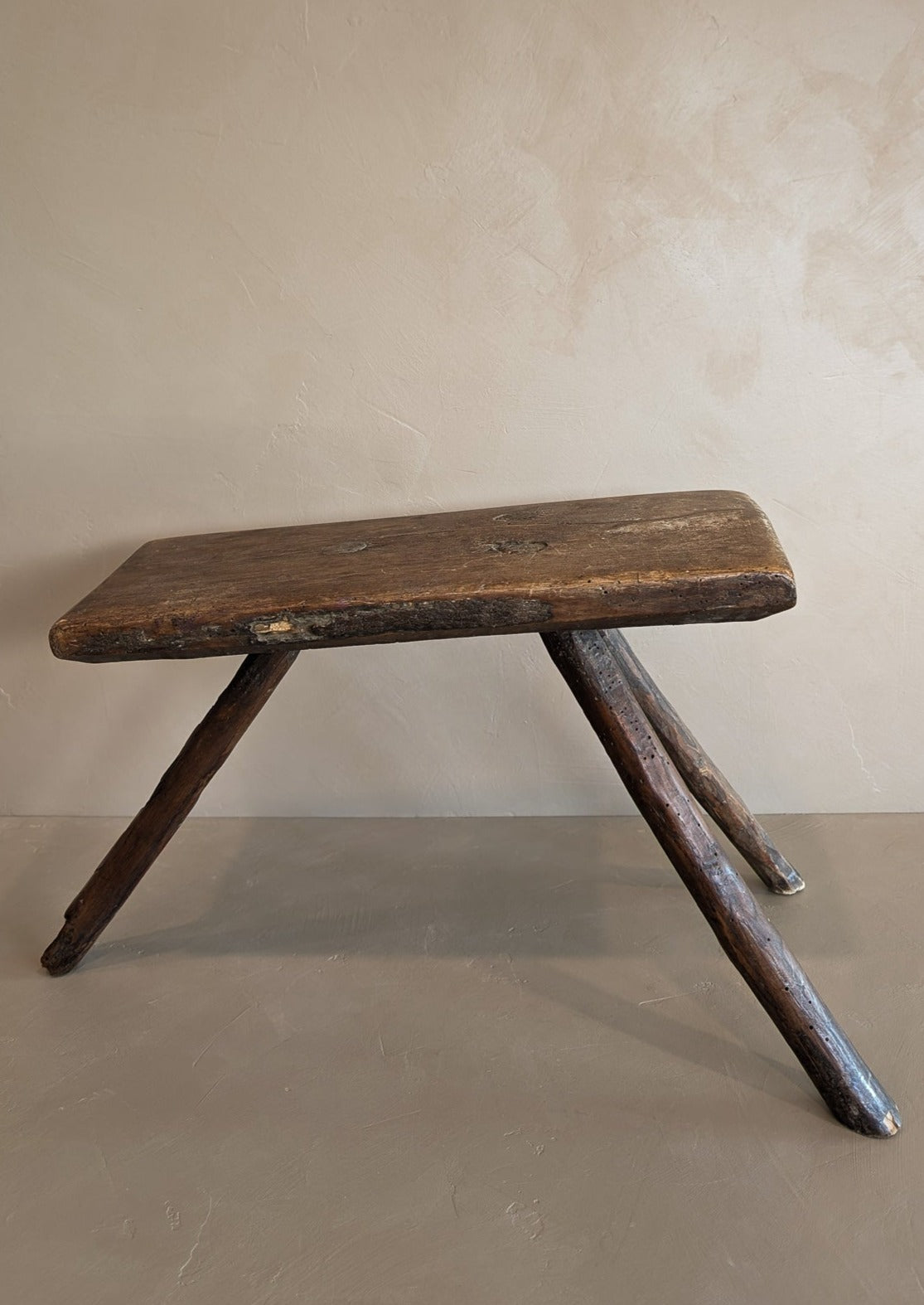 Primitive European Three-Legged Wooden Stool with Slanted Top