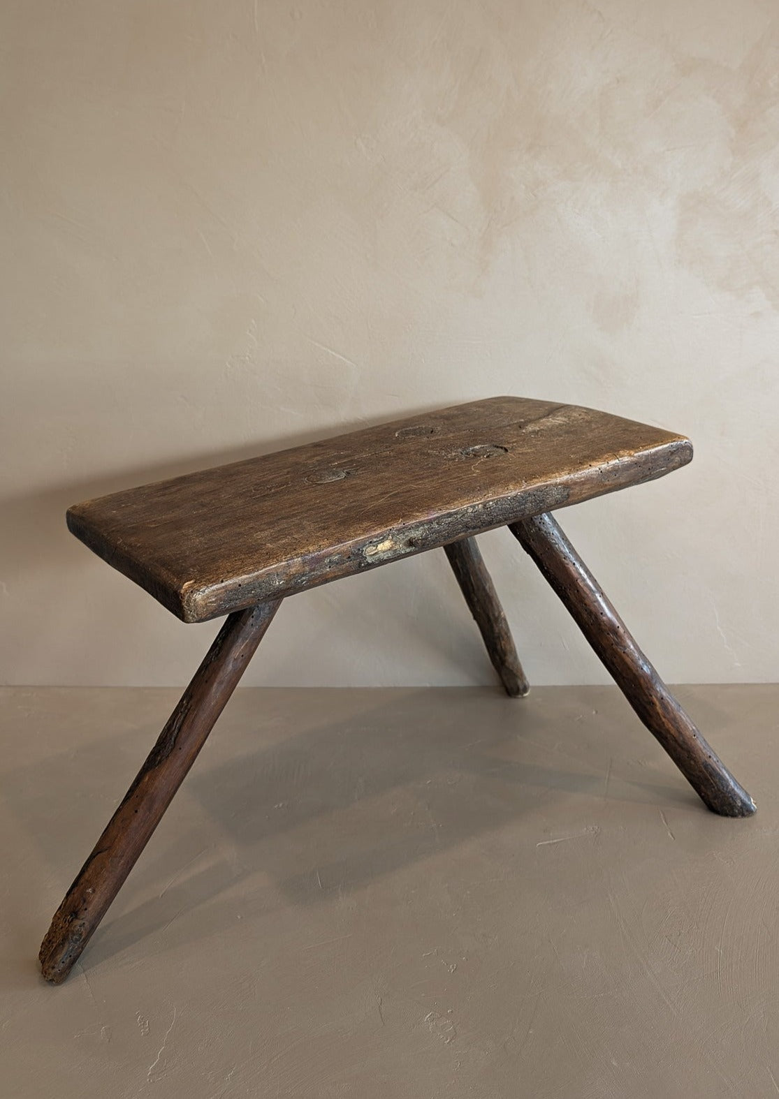 Primitive European Three-Legged Wooden Stool with Slanted Top