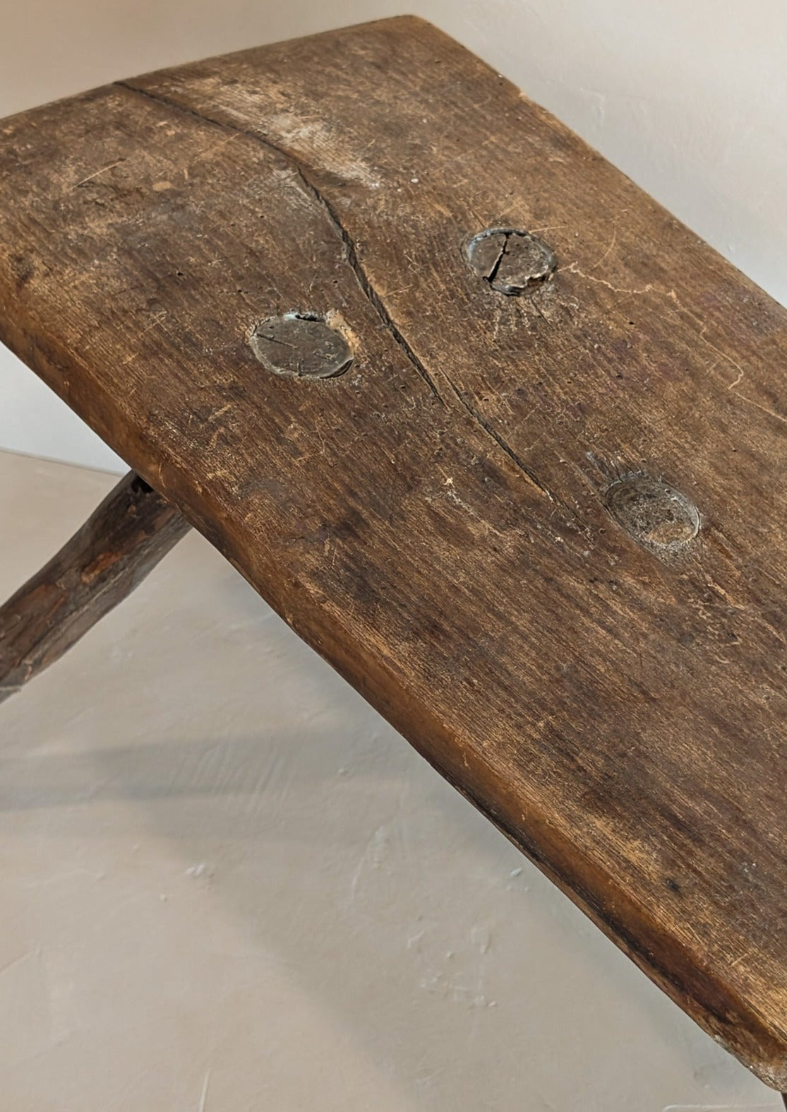 Primitive European Three-Legged Wooden Stool with Slanted Top