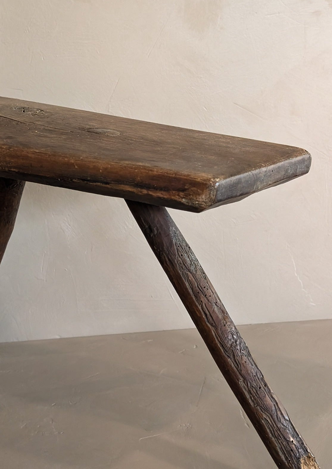 Primitive European Three-Legged Wooden Stool with Slanted Top