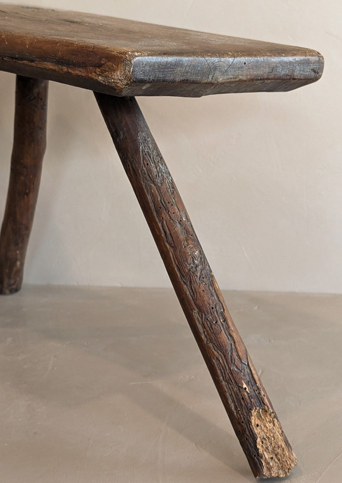 Primitive European Three-Legged Wooden Stool with Slanted Top