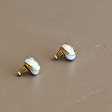 Pair of Vintage White and Gold-Tone Knot Costume Jewelry Earrings