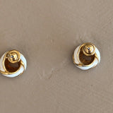 Pair of Vintage White and Gold-Tone Knot Costume Jewelry Earrings