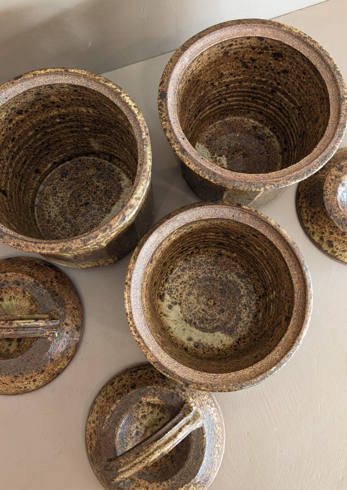 Trio of Speckled Studio Pottery Lidded Canisters