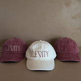 Embroidered Levity Interiors Hat with Leather Strap and Brass Clasp - Burgundy Hat with Cream Thread