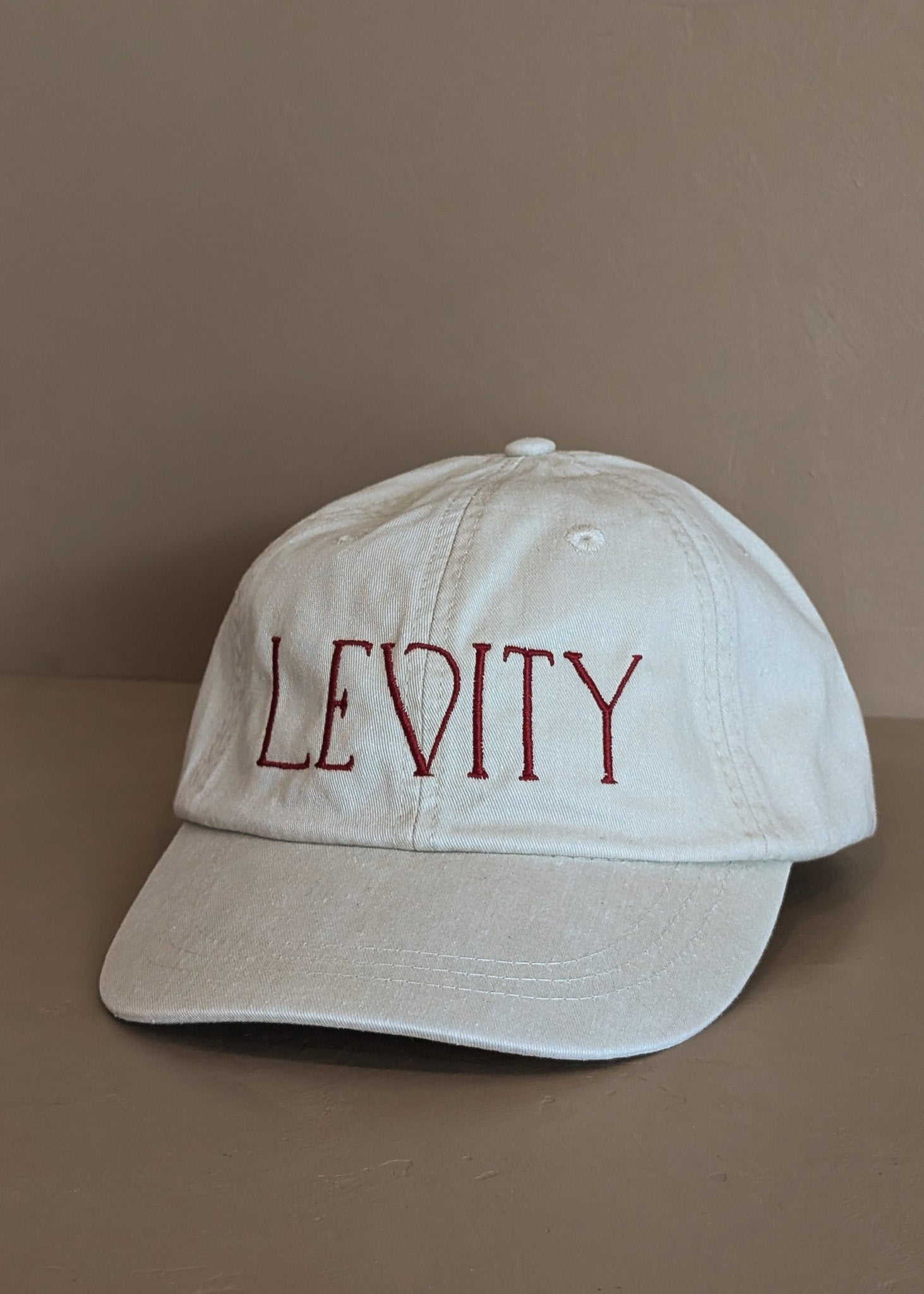 Embroidered Levity Interiors Hat with Leather Strap and Brass Clasp - Cream Hat with Burgundy Thread