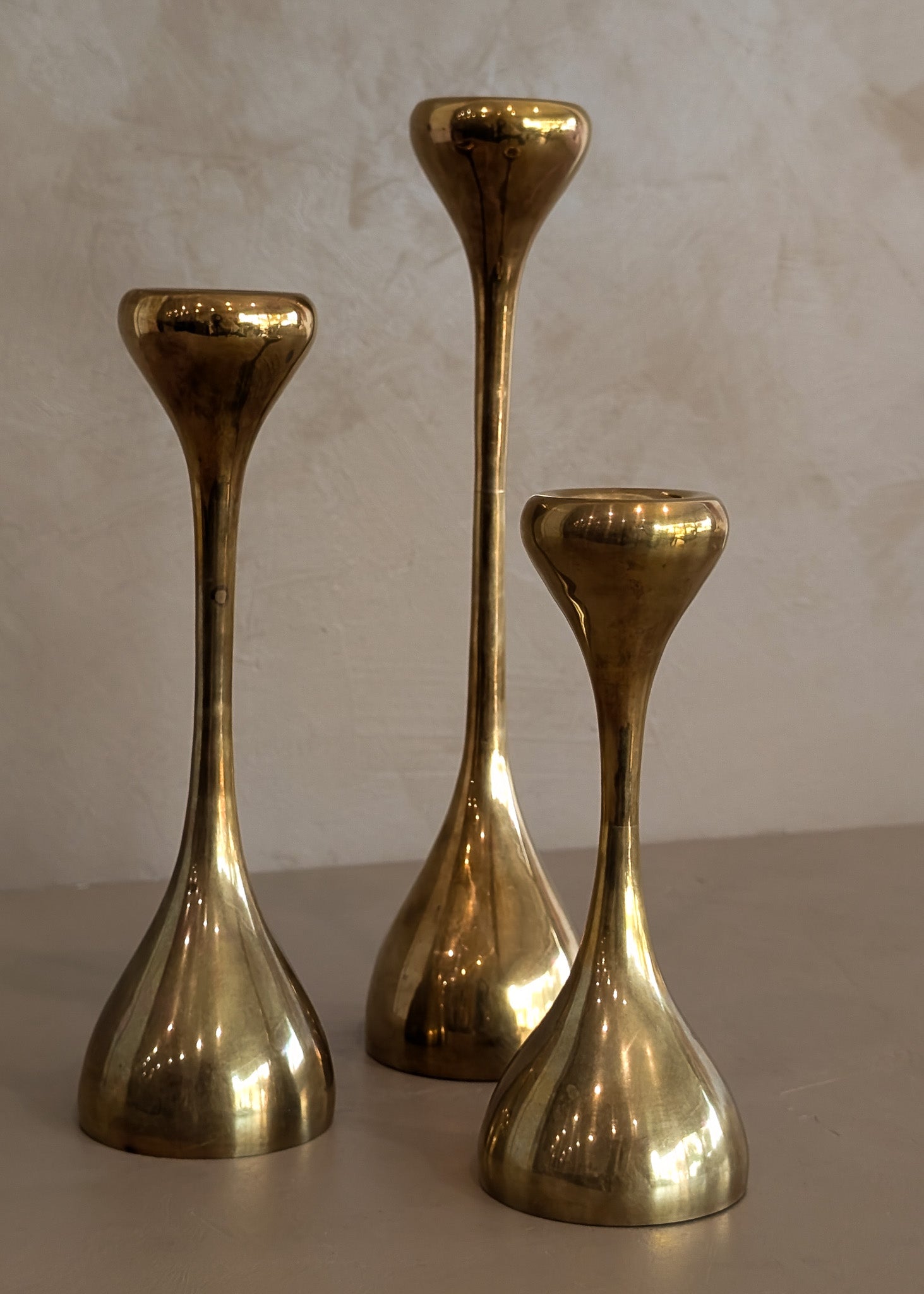 Trio of Midcentury Swedish Brass Candleholders