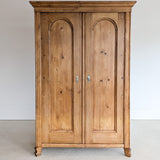 Handsome Antique European Pine Cabinet with Arched Panel Doors, Carved Feet and Skeleton Key