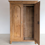 Handsome Antique European Pine Cabinet with Arched Panel Doors, Carved Feet and Skeleton Key