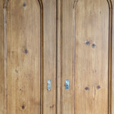 Handsome Antique European Pine Cabinet with Arched Panel Doors, Carved Feet and Skeleton Key