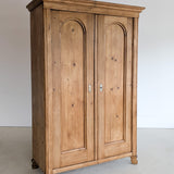 Handsome Antique European Pine Cabinet with Arched Panel Doors, Carved Feet and Skeleton Key