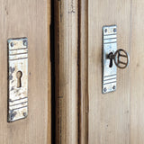 Handsome Antique European Pine Cabinet with Arched Panel Doors, Carved Feet and Skeleton Key
