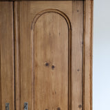 Handsome Antique European Pine Cabinet with Arched Panel Doors, Carved Feet and Skeleton Key