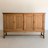 Vintage Midcentury Danish Henning Kjærnulf-Attributed Tall Oak Sideboard Cabinet with Carved Sliding Doors
