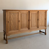 Vintage Midcentury Danish Henning Kjærnulf-Attributed Tall Oak Sideboard Cabinet with Carved Sliding Doors