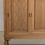 Vintage Midcentury Danish Henning Kjærnulf-Attributed Tall Oak Sideboard Cabinet with Carved Sliding Doors