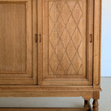 Vintage Midcentury Danish Henning Kjærnulf-Attributed Tall Oak Sideboard Cabinet with Carved Sliding Doors