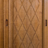 Vintage Midcentury Danish Henning Kjærnulf-Attributed Tall Oak Sideboard Cabinet with Carved Sliding Doors