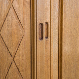 Vintage Midcentury Danish Henning Kjærnulf-Attributed Tall Oak Sideboard Cabinet with Carved Sliding Doors