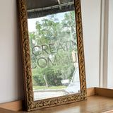 Large Antique Gilded Plaster and Wood Mirror with Wavy Glass