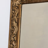 Large Antique Gilded Plaster and Wood Mirror with Wavy Glass