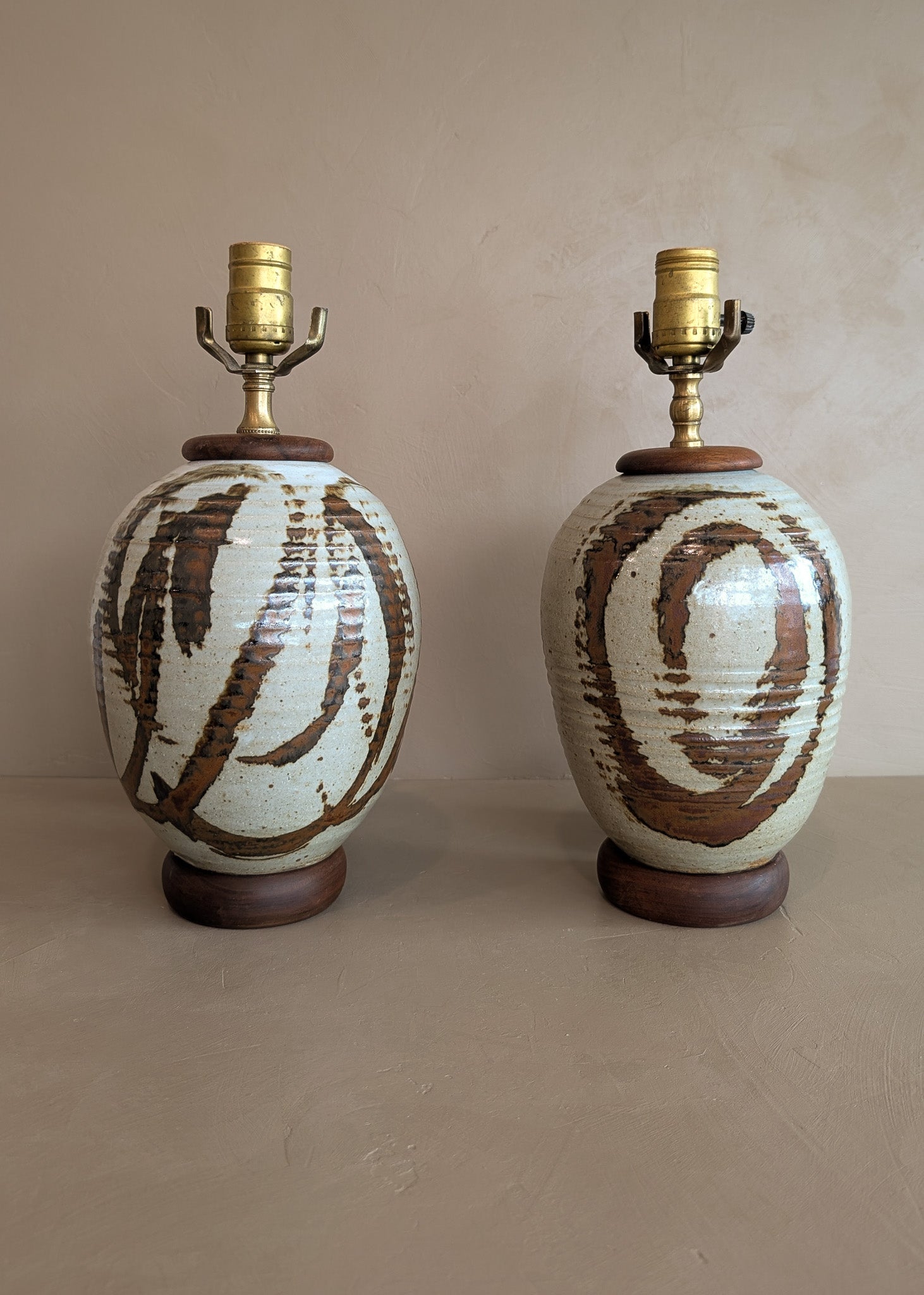 Pair of Vintage Neutral Studio Pottery and Teak Wood Lamps with Freeform Detailing