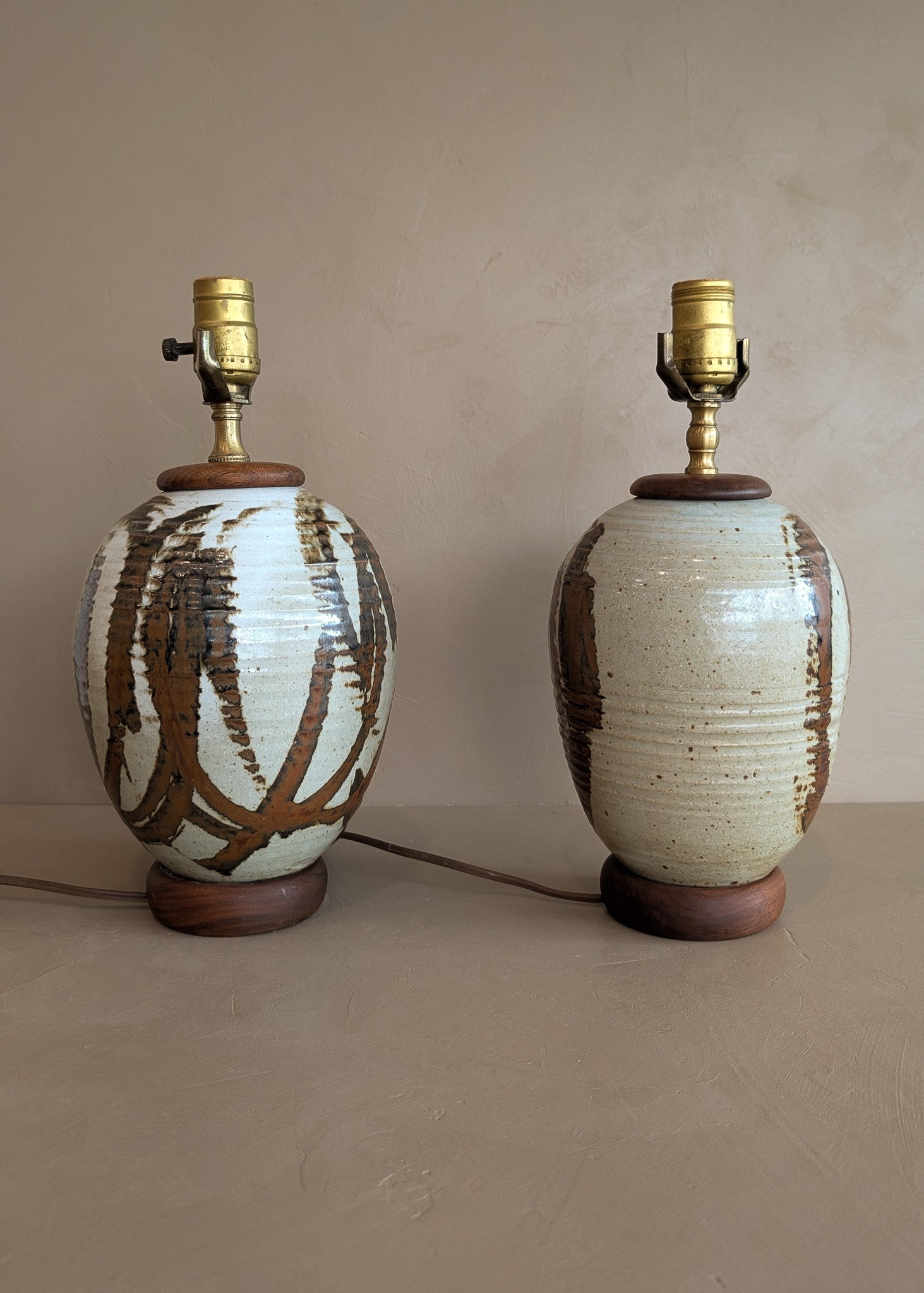 Pair of Vintage Neutral Studio Pottery and Teak Wood Lamps with Freeform Detailing