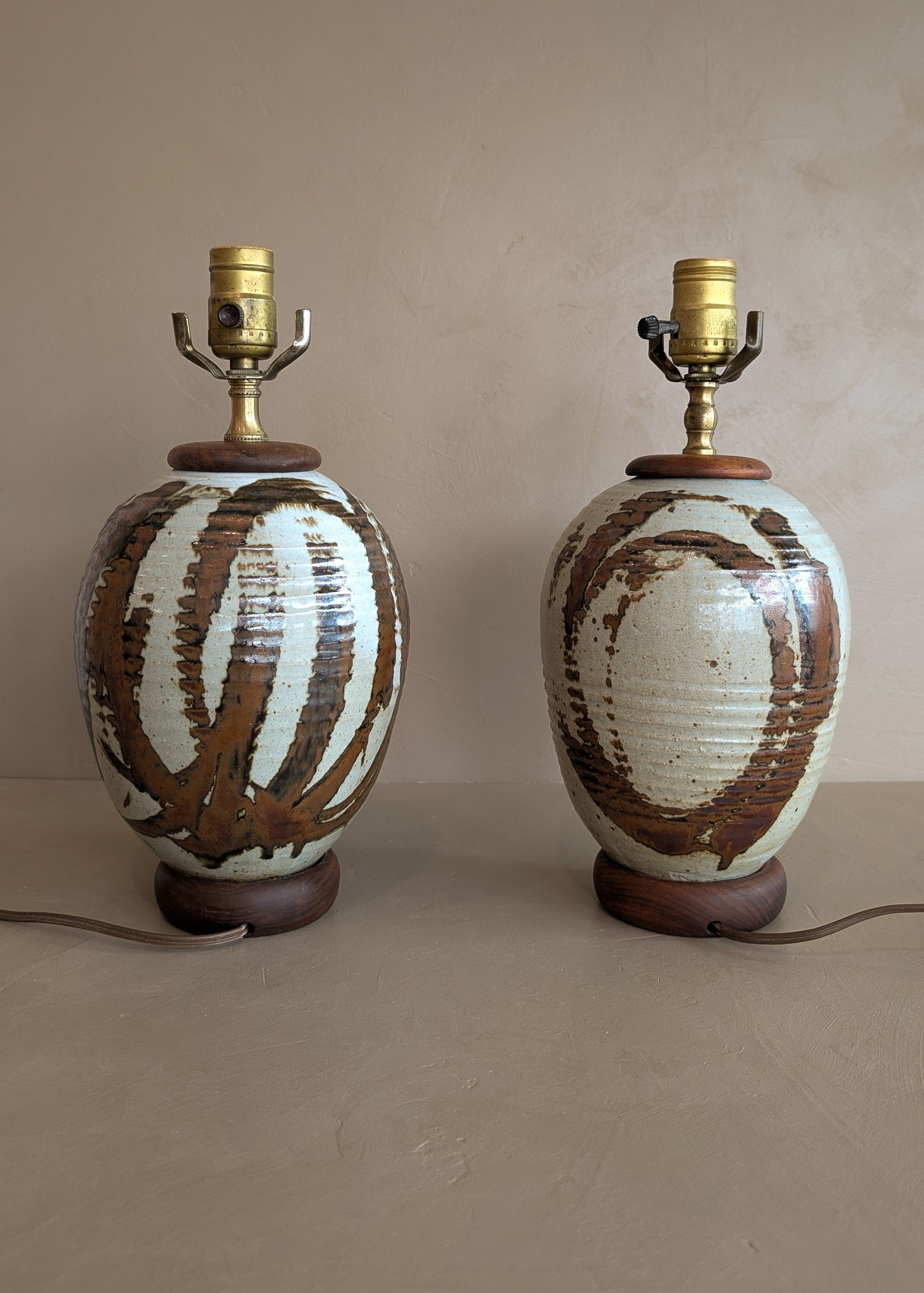 Pair of Vintage Neutral Studio Pottery and Teak Wood Lamps with Freeform Detailing